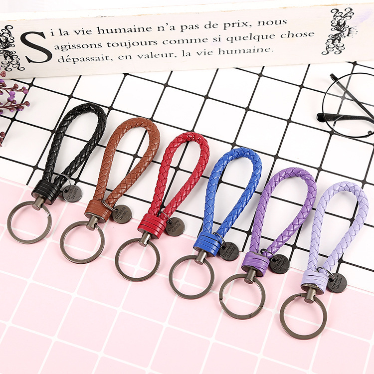 Factory car creative hand-woven tungsten steel leather rope keychain ladies key ring car pendant gifts