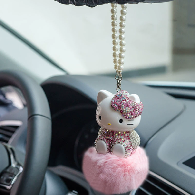 К tattoo? Actually translation: Katie car pendant hair ball cat inlaid diamonds KT ornament car interior pendant interior supplies car net red DIY