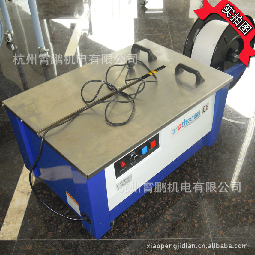 厂家供应低台半自动打包机 废纸纸箱捆扎机 自动打包机批发