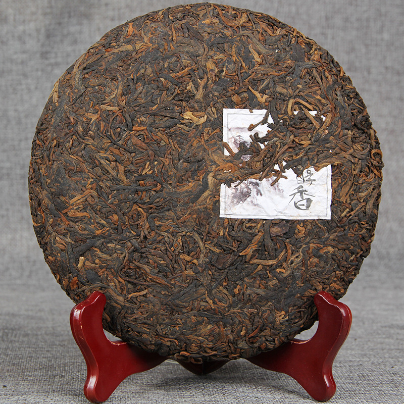 Wholesale ripe Pu-erh tea with wild charm and mellow aroma seven-leaf tea cakes, Bu Long ancient tree Pu-erh tea pure fermentation.