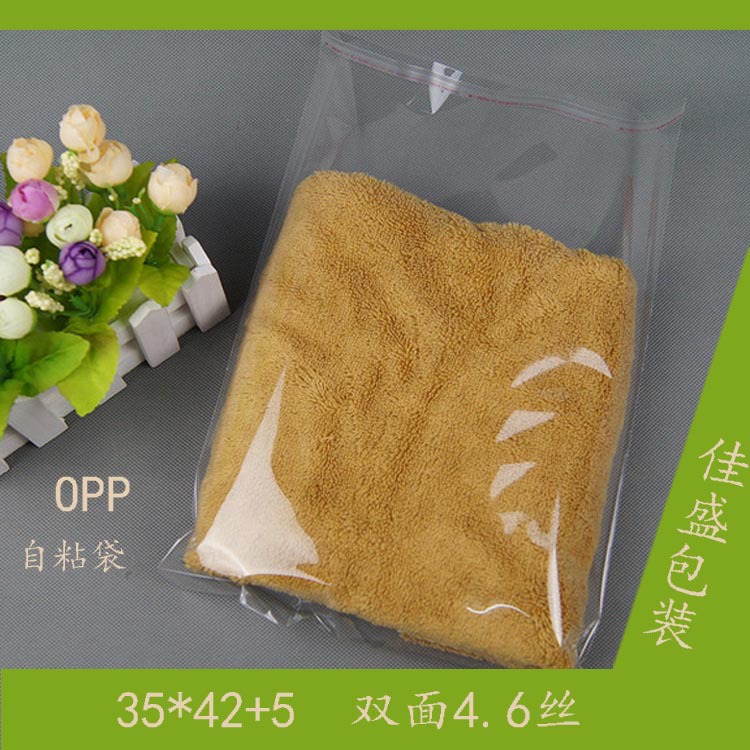 厂家批发校服包装袋OPP服装袋透明OPP不干胶自粘袋内衣塑料热切花