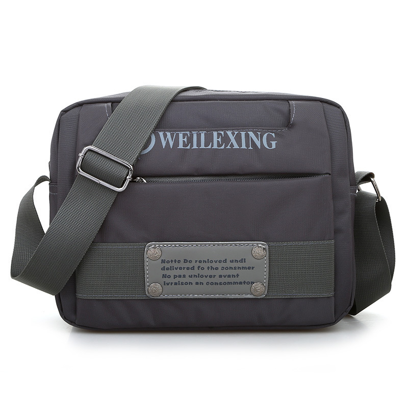 Bolso bandolera unisex de nailon de nuevo estilo, color liso, moderno, impermeable, ligero, para viaje, modelo unisex.