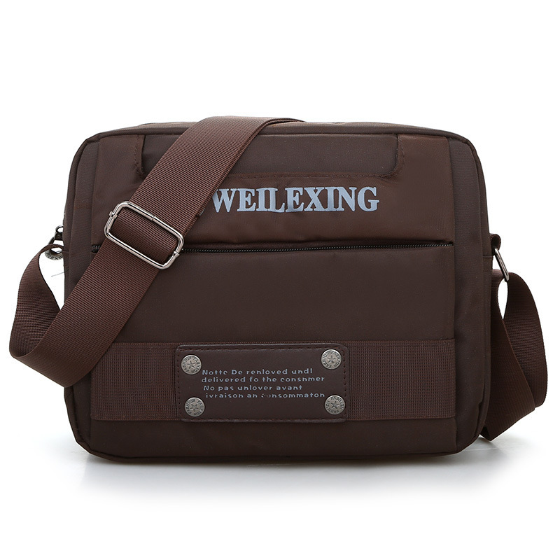 Bolso bandolera unisex de nailon de nuevo estilo, color liso, moderno, impermeable, ligero, para viaje, modelo unisex.