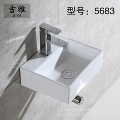 ヨーロッパ式のシンプルな白い洗面器の陶磁器の厚い辺の台の上でたらいの芸術のたらいのトイレのベランダの洗面器のたらい