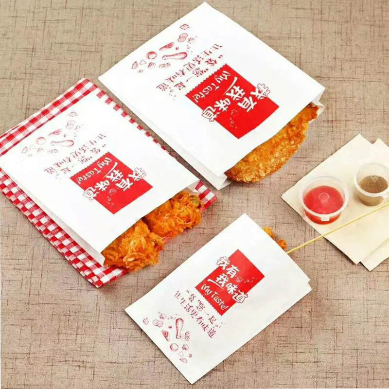 大脸鸡排纸袋手提塑料袋打包袋新款防油食品包装塑料袋纸袋可制作