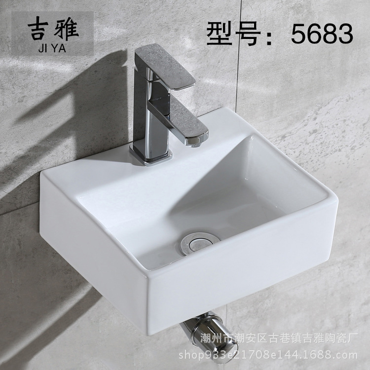 ヨーロッパ式のシンプルな白い洗面器の陶磁器の厚い辺の台の上でたらいの芸術のたらいのトイレのベランダの洗面器のたらい|undefined