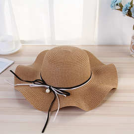 一件代发草编珍珠遮阳帽女式 2024夏季新款波浪卷边织带沙滩帽