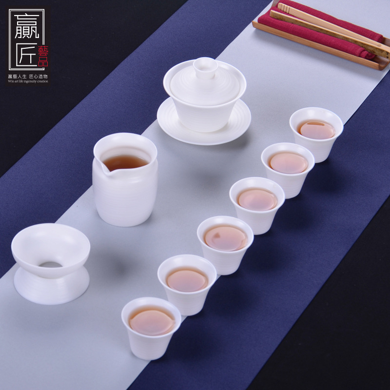 Winjiang ovejas grasa Jade porcelana Kung Fu juego de té traje de hogar Dehua porcelana blanca juego de té fabricante de té mano tirón embrión taza de té conjunto