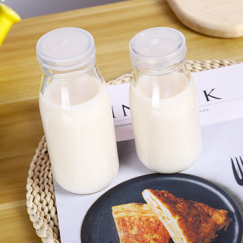 En stock 200 ml botella de yogurt 500ml cubierta de hierro botella de leche de vidrio uno Jin 2 Jin Barra de leche fresca botella de yogurt