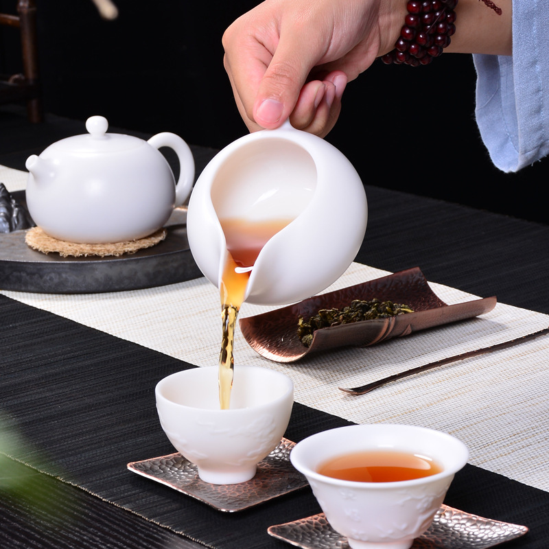 Winjiang dehua porcelana blanca Taza de cerámica taza masculina dispensador de té oveja grasa Jade porcelana promedio taza Kung Fu juego de Té mar Accesorios