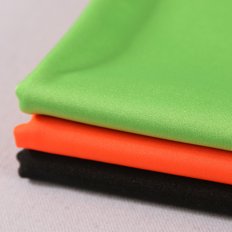 现货供应 涤氨经编弹力单面有光针织面料 泳装运动服外套风衣布料