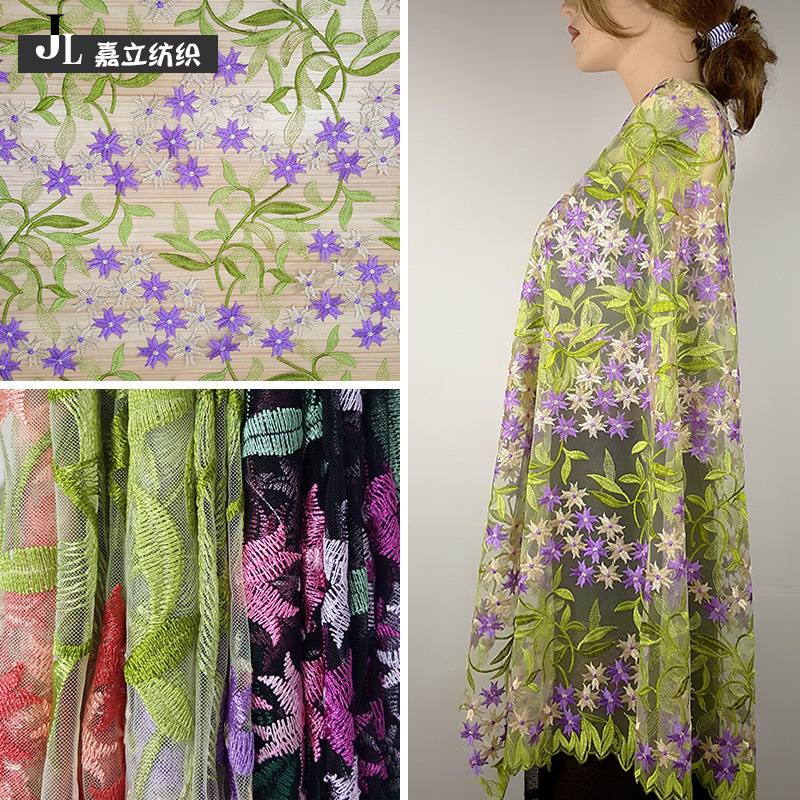 厂家现货双色涤纶丝网纱水溶刺绣满幅花边彩色植物花朵连衣裙面料