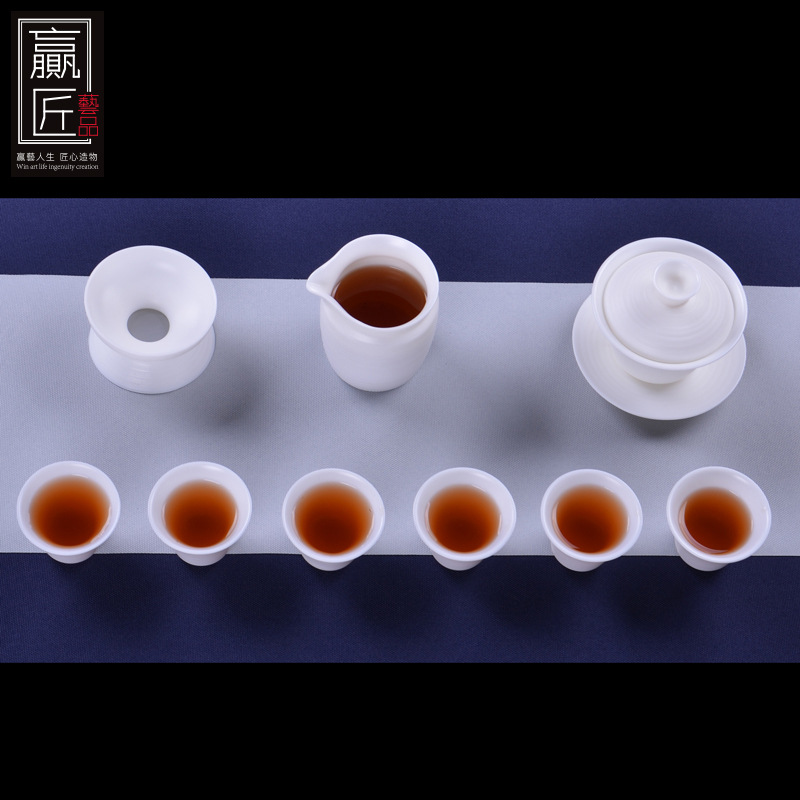 Winjiang ovejas grasa Jade porcelana Kung Fu juego de té traje de hogar Dehua porcelana blanca juego de té fabricante de té mano tirón embrión taza de té conjunto