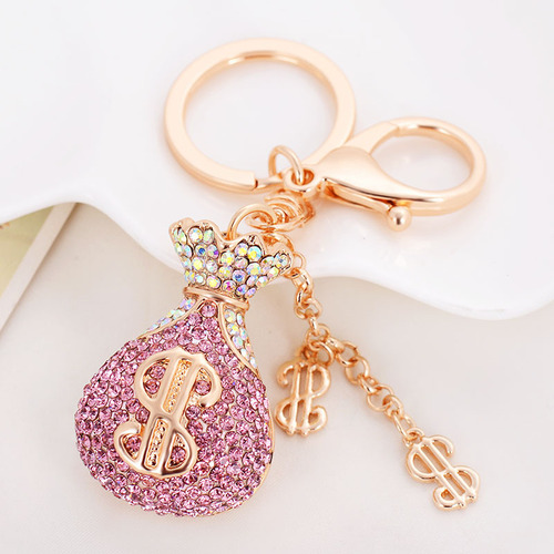 Alloy diamond-encrusted dollar purse keychain car pendant lucky bag bag pendant manufacturer direct sale creative small gift