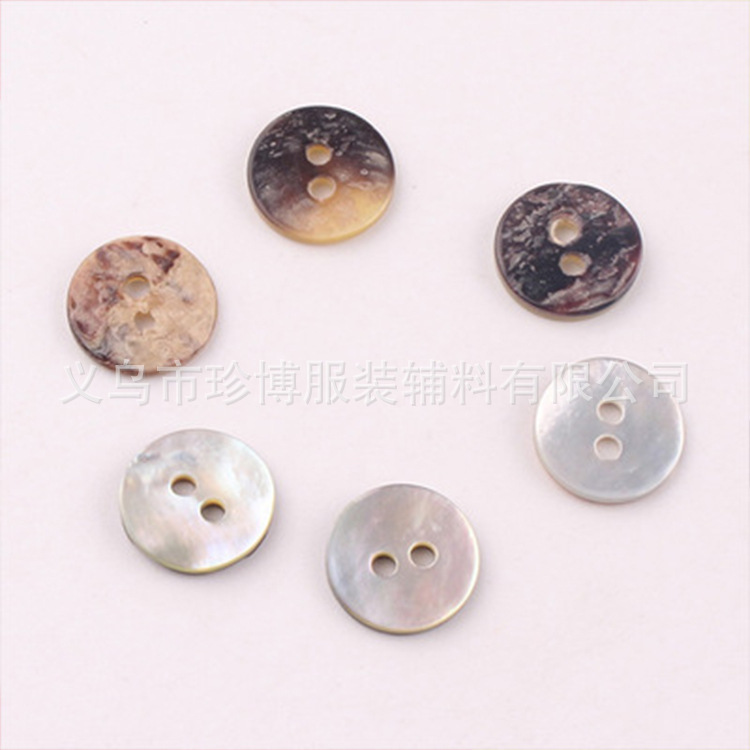 现货批发海外日本马氏贝壳扣 贝壳有眼扣子 圆形四眼氏贝壳扣