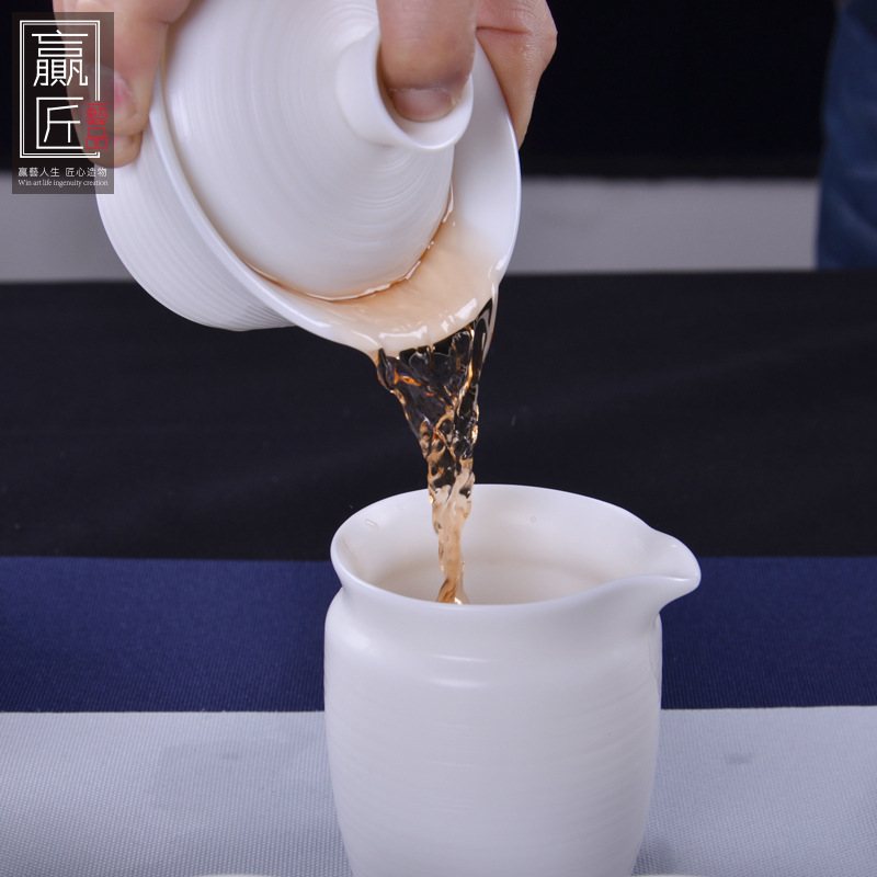 Winjiang ovejas grasa Jade porcelana Kung Fu juego de té traje de hogar Dehua porcelana blanca juego de té fabricante de té mano tirón embrión taza de té conjunto
