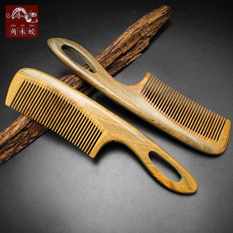 厂家批发角木蛟绿檀木梳子檀香木镂空手柄梳制做作款
