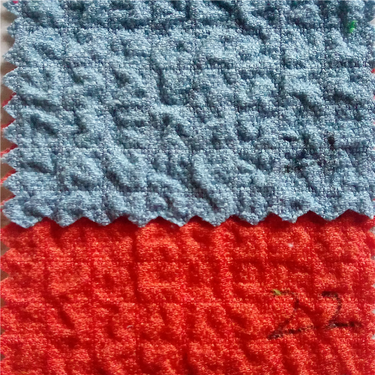 现货供应全涤泡泡提花面料皱布时尚女装连衣裙时装面料肌理感强