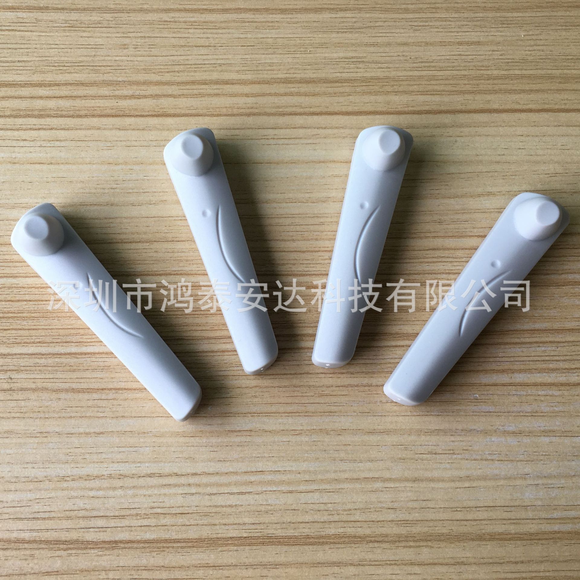 鸿泰安型号HTA-T10XL声磁防盗扣,58KHZ服装卖场防盗扣 防盗磁扣