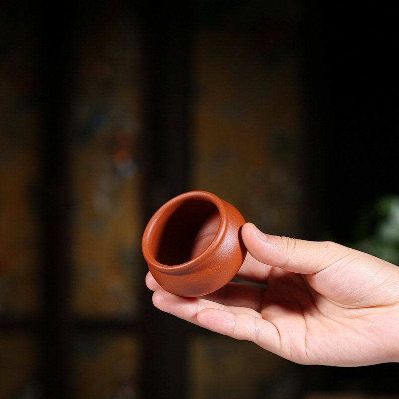 Suministro directo de fábrica Master Cup productos genuinos Yixing mineral en bruto arena púrpura taza personal hecho a mano tarro redondo taza de té entrega de una sola pieza