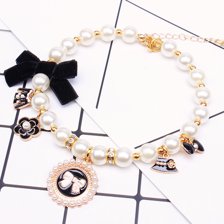 Collar de perlas fuente fabricante joyería para mascotas perro cadena Teddy encaje arco Cat Bell