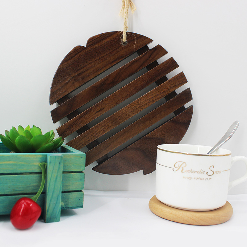 Estilo japonés creativo en forma de pez mantel de madera de nogal negro de madera maciza estera de aislamiento anti-escaldado mantel estera de la olla letras