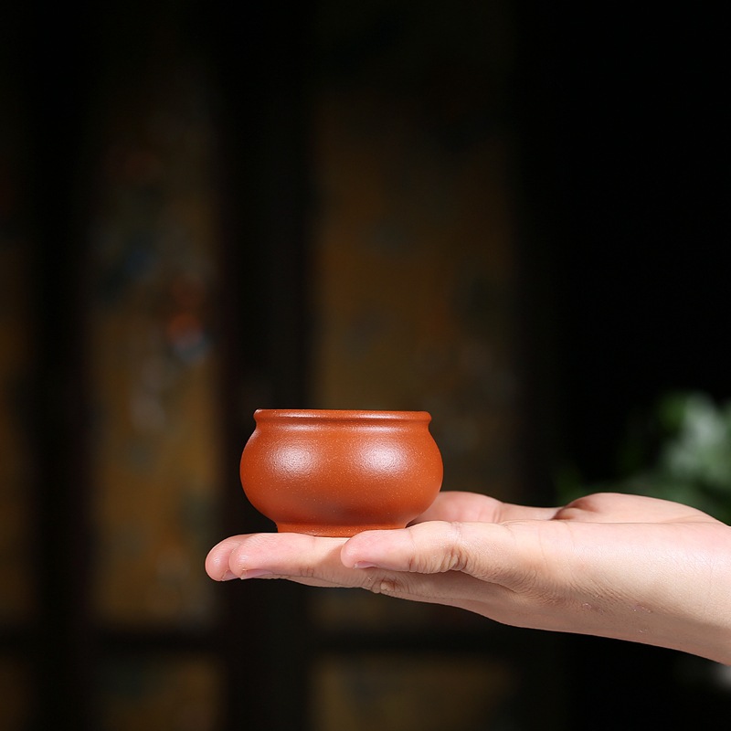 Suministro directo de fábrica Master Cup productos genuinos Yixing mineral en bruto arena púrpura taza personal hecho a mano tarro redondo taza de té entrega de una sola pieza