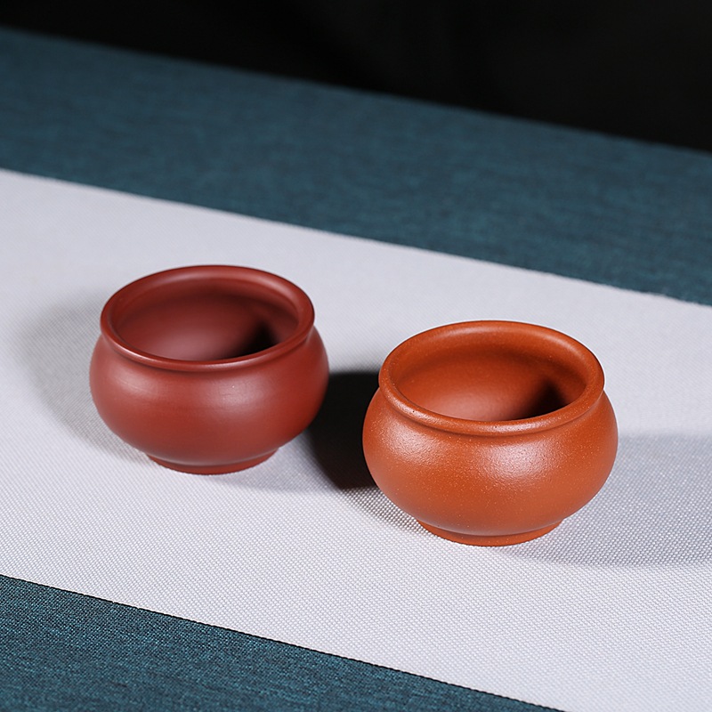 Suministro directo de fábrica Master Cup productos genuinos Yixing mineral en bruto arena púrpura taza personal hecho a mano tarro redondo taza de té entrega de una sola pieza