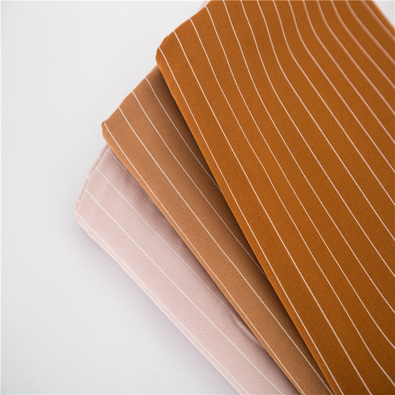 际安纺织色织竖条斜纹微弹面料春季休闲服装裙子时装衬衫裤子布料