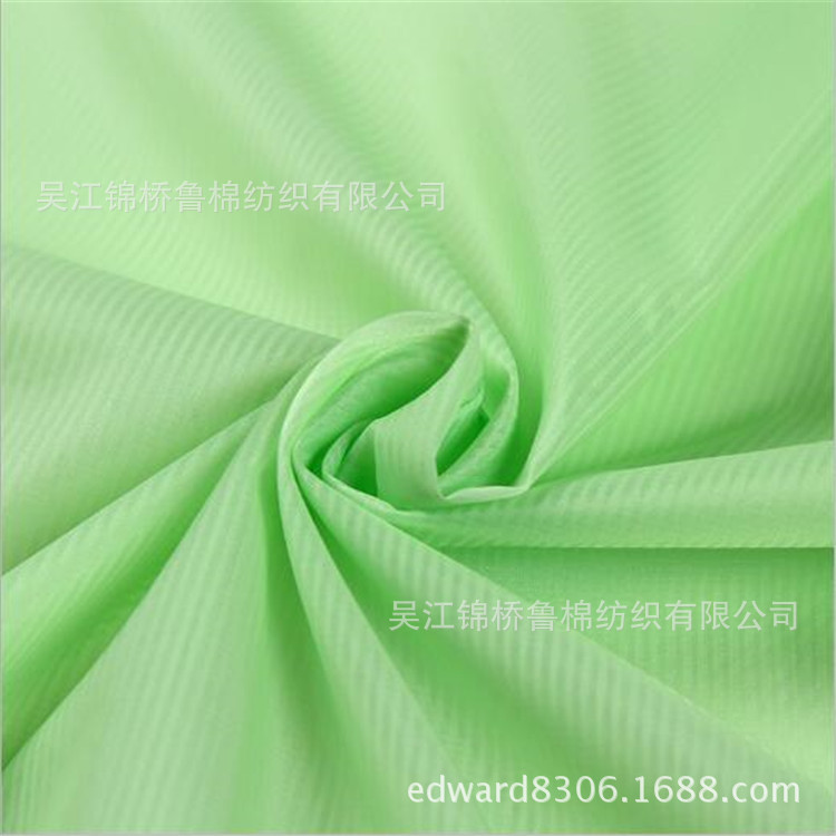 15D斜纹消光尼丝纺380t-400T格子横条提花复膜阻燃防静电油面轧光