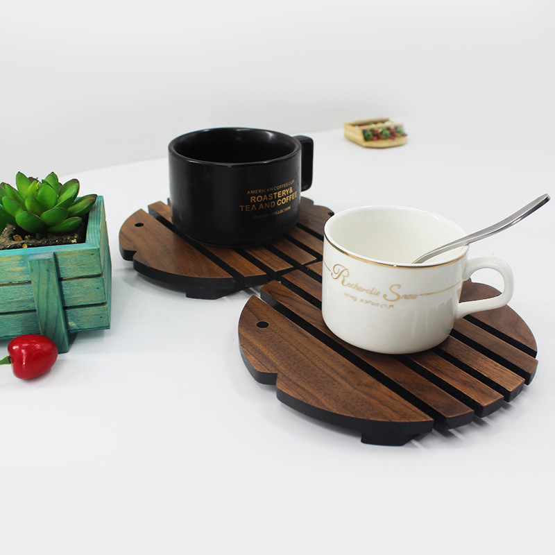 Estilo japonés creativo en forma de pez mantel de madera de nogal negro de madera maciza estera de aislamiento anti-escaldado mantel estera de la olla letras