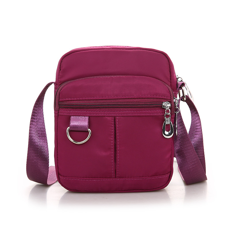 Nueva bolsa de mensajero de las mujeres bolsa pequeña de nylon Oxford bolsa de tela multi-compartimiento pequeña bolsa de mediana edad casual bolsa de hombro ventas directas de la fábrica