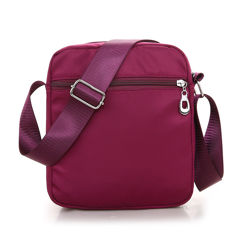 Nueva bolsa de mensajero de las mujeres bolsa pequeña de nylon Oxford bolsa de tela multi-compartimiento pequeña bolsa de mediana edad casual bolsa de hombro ventas directas de la fábrica