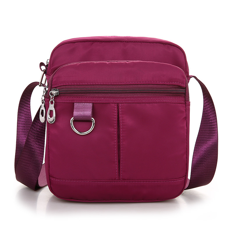 Nueva bolsa de mensajero de las mujeres bolsa pequeña de nylon Oxford bolsa de tela multi-compartimiento pequeña bolsa de mediana edad casual bolsa de hombro ventas directas de la fábrica