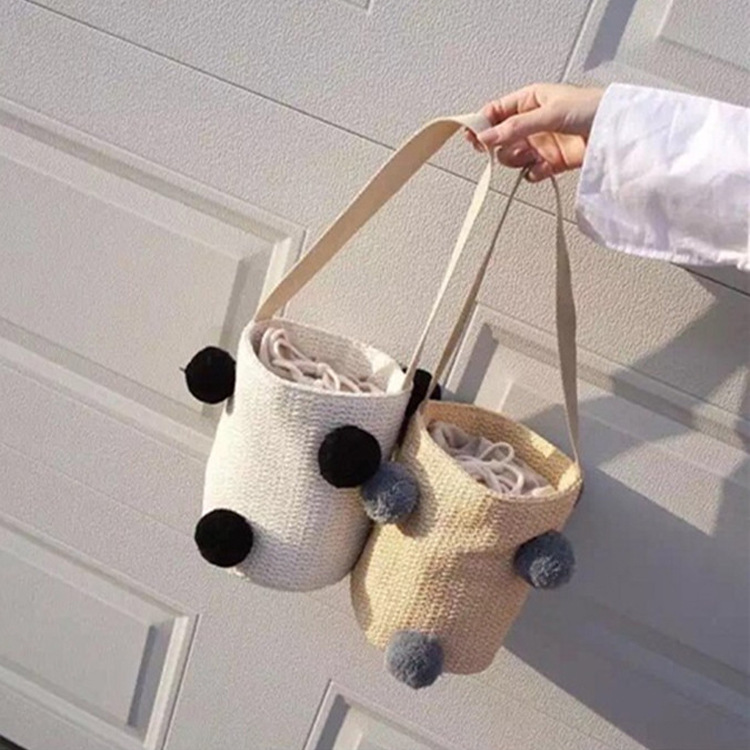 一件代发新款毛球球水桶包草编包沙滩包编织包休闲女包