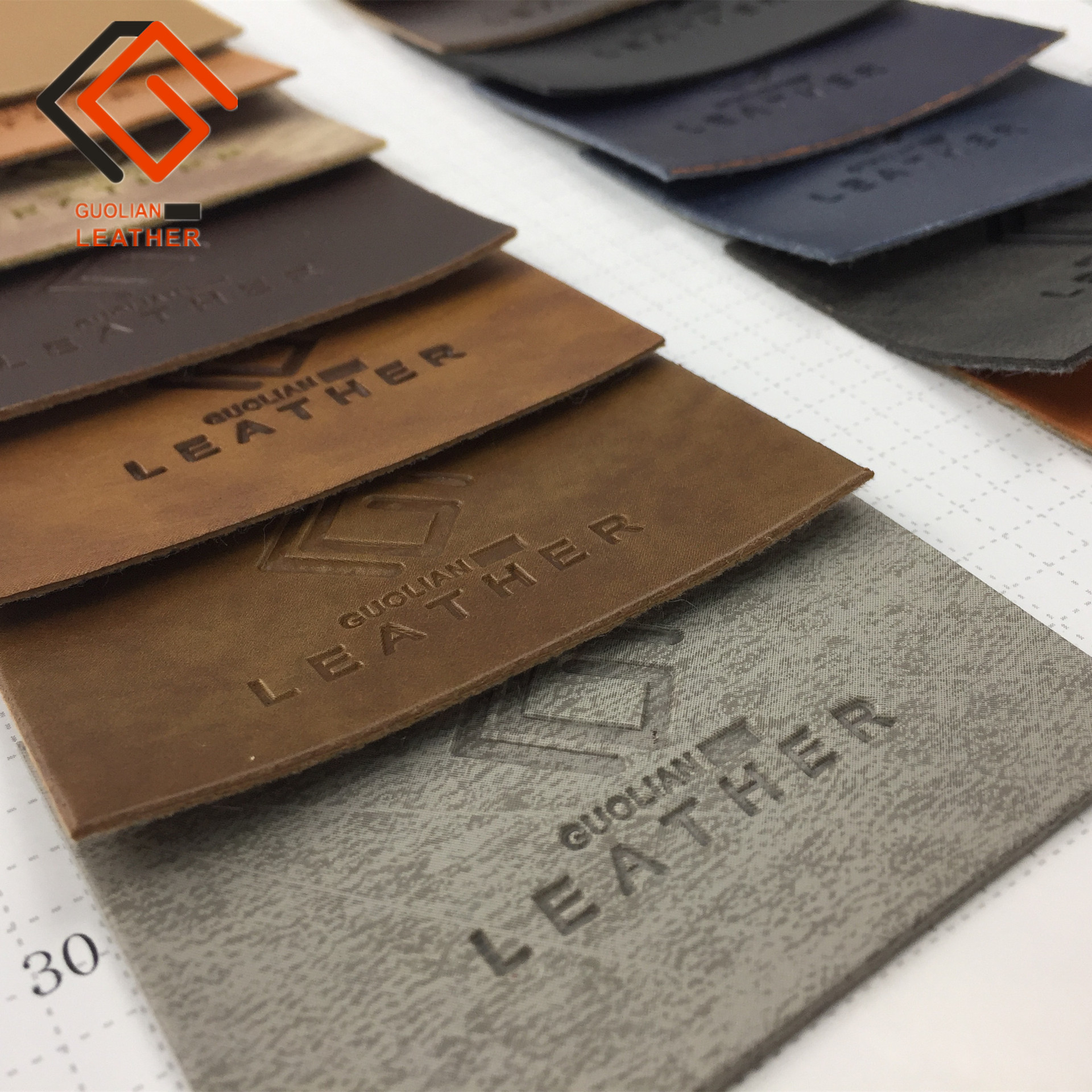 PU太空革压变商标皮革变色体育皮标玩具服装牛仔裤LOGO革双色可选