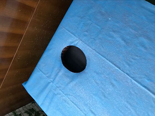 Disposable bed sheet beauty salon pad sheet thickened waterproof and oil-proof with round hole push oil with hole non-woven single bed
