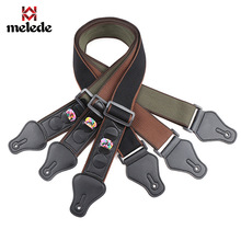 亚马逊爆款黑色纯棉吉它带 民谣吉他普及背带多功能三个拔片现货