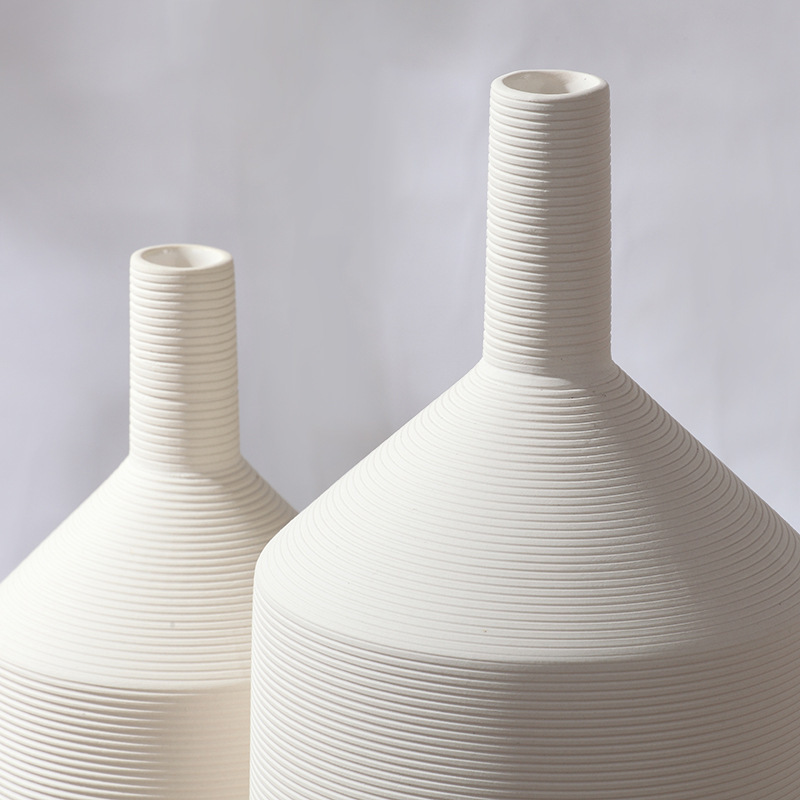 Moderno simple pigmento blanco quema de cerámica florero salón muebles para el hogar adornos modernos artesanías decorativas al por mayor