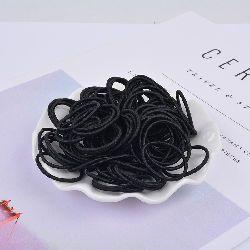 Venta caliente en línea cuerda de pelo 100 piezas banda de pelo para niños bebé color caramelo cuerda de pelo niña banda de goma accesorios para el cabello al por mayor