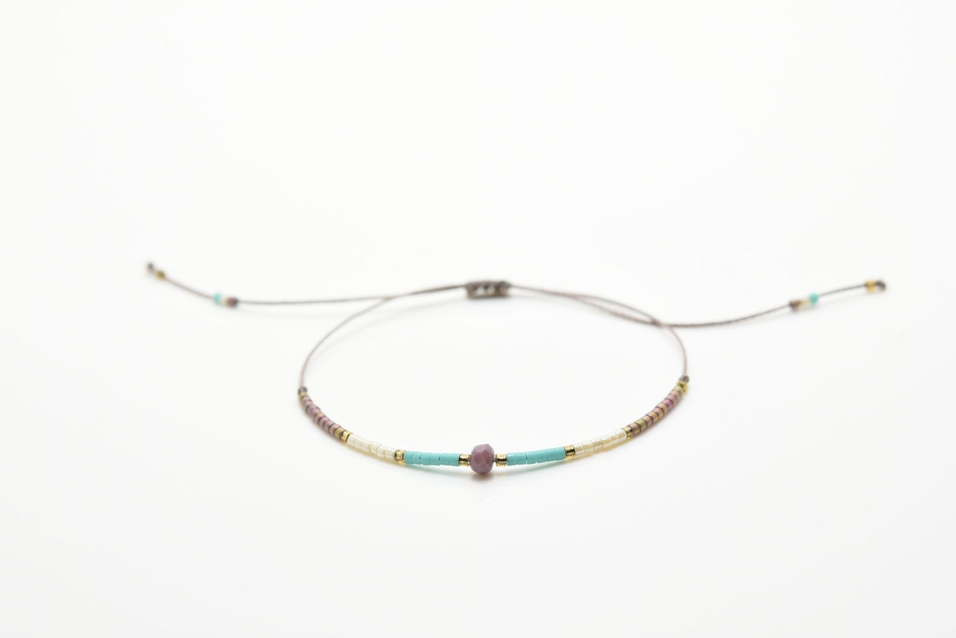 DIY pulsera de la joyería de las mujeres simples granos de arroz personalidad original artesanía color mezclado tejido joyería de moda ventas directas de la fábrica