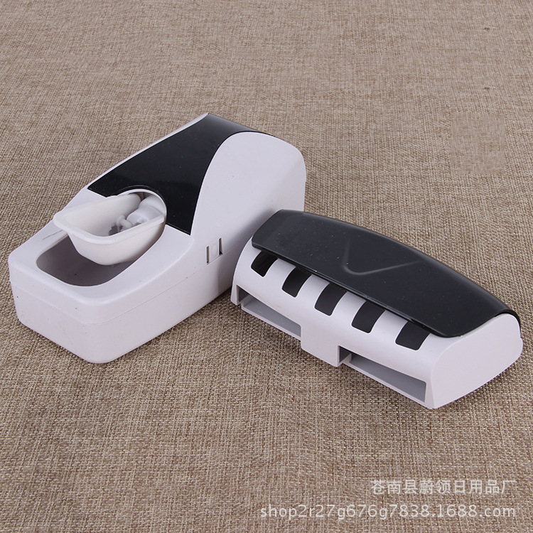 Fábrica directa personalidad creativa máquina de exprusión de pasta de dientes plástica productos sanitarios en línea famosa máquina de exprusión automática de pasta de dientes