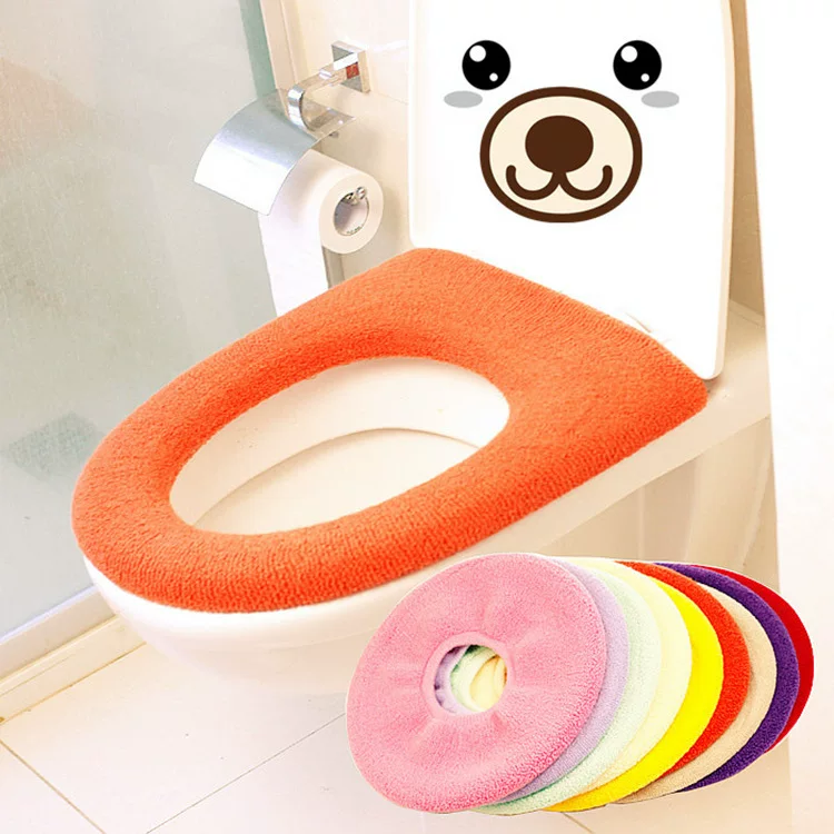 Handheld universal toilet seat
