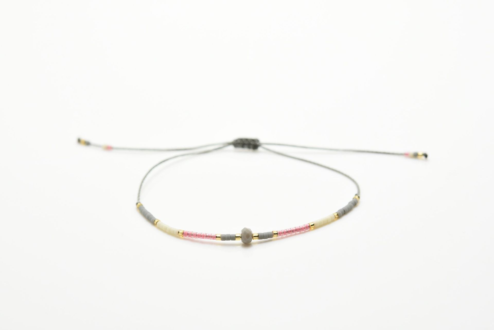 DIY pulsera de la joyería de las mujeres simples granos de arroz personalidad original artesanía color mezclado tejido joyería de moda ventas directas de la fábrica