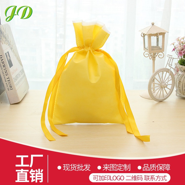 Multi-Color caramelo en blanco embalaje bolsa de cordón en stock cordón pequeño bolso de regalo no tejido bolso de lazo al por mayor