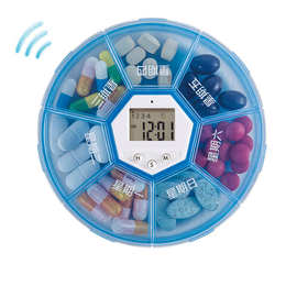跨境智能电子药盒格便携式定时提醒药盒圆形七格药盒夜间照明药盒