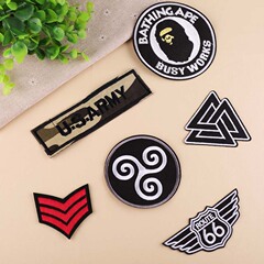 Embroidered patch with a cute red panda design, perfect for DIY projects. Ideal for decorating clothing, bags, and other items. High-quality material for a durable and vibrant look.