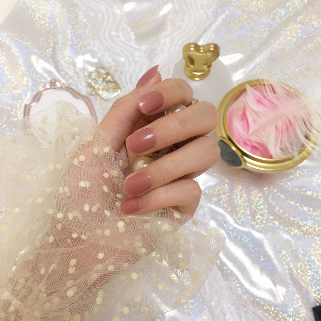 Manicura acabado color sólido parche de uñas falso corto 24 unidades traje caramelo multicolor europeo y americano colección japonesa y coreana