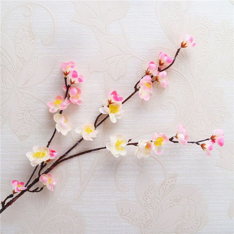 Venta al por mayor chino pastoral flor artificial del ciruelo al por mayor flor falsa pequeña flor del ciruelo rama salón flor decorativa
