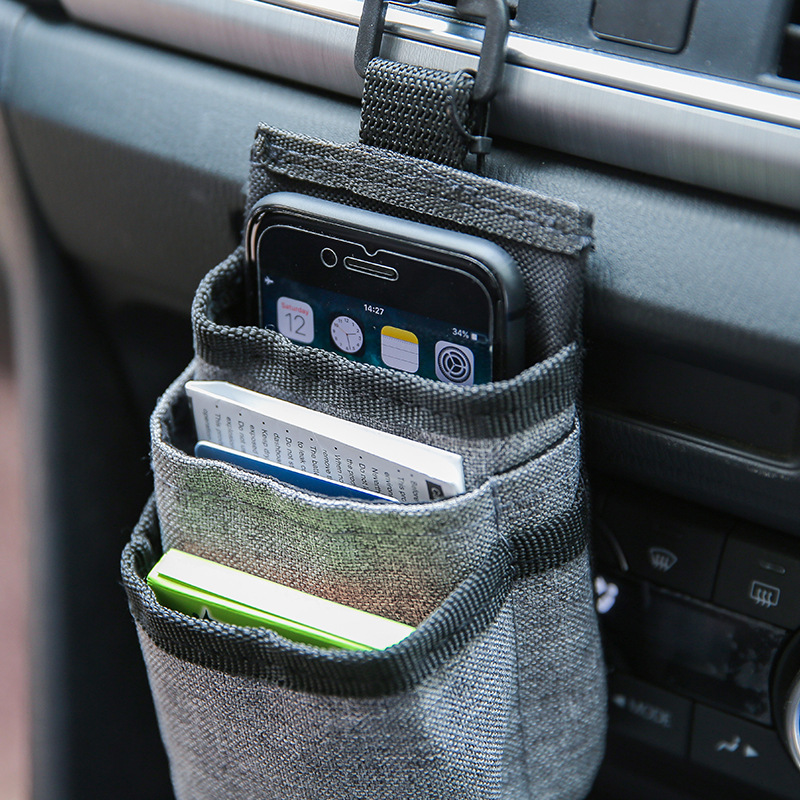汽车通风口收纳包车载手机充电宝证件等置物袋带数据线孔车用挂袋